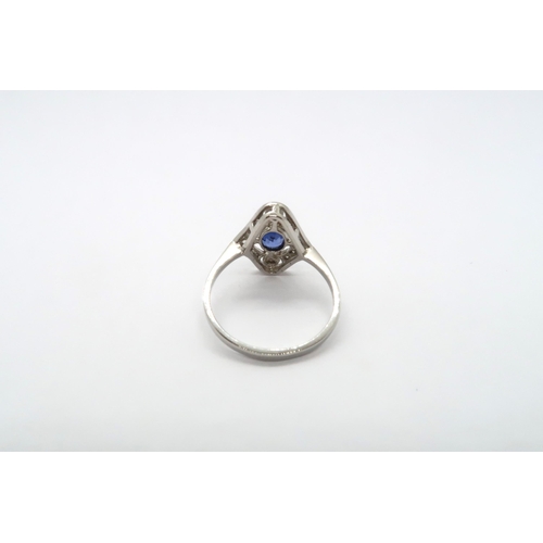 74 - A platinum Art Deco style sapphire and diamond ring, sapphire good colour, diamonds are bright and l... 