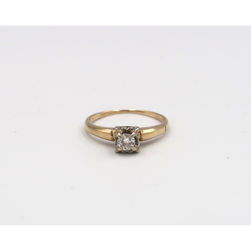 76 - An illusion set 14ct yellow gold and diamond solitaire ring with chip - ring size M - 1.9 grams