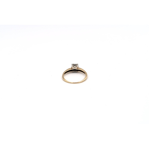 76 - An illusion set 14ct yellow gold and diamond solitaire ring with chip - ring size M - 1.9 grams