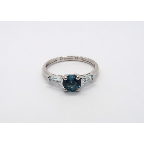 79 - A 9ct white gold blue topaz and aquamarine ring, head size approx 15mm x 6mm, size O/P