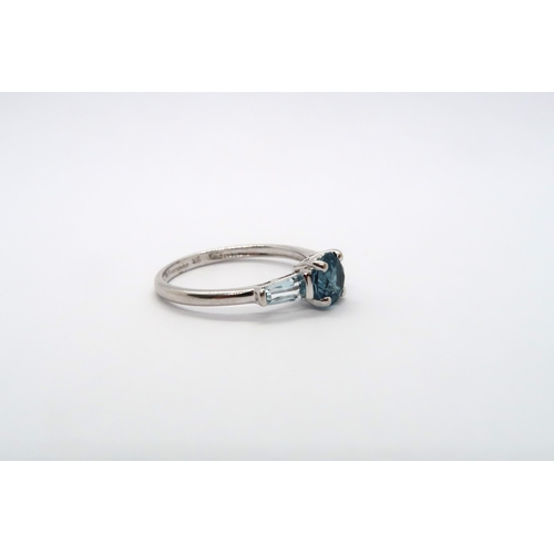 79 - A 9ct white gold blue topaz and aquamarine ring, head size approx 15mm x 6mm, size O/P