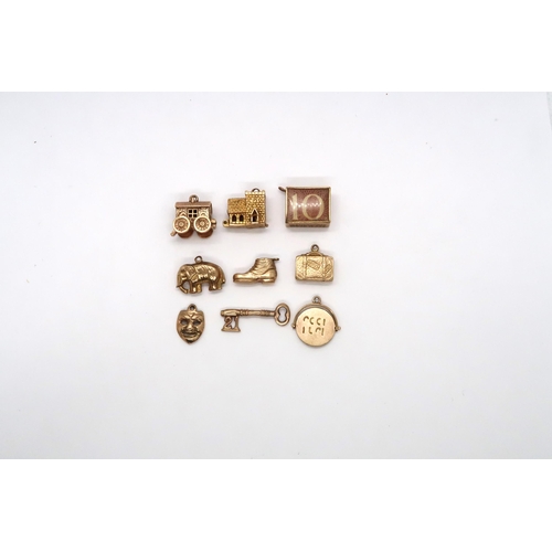 81 - Nine, 9ct Yellow Gold charms in the form of a miniature Vesta, elephant, etc.. Total weight 14.1 gra... 