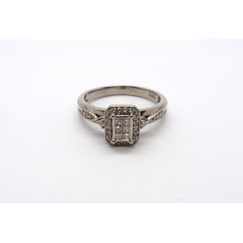 94 - A paladium Art Deco style diamond cluster ring with diamond shoulders, head size approx 9mm x 8mm, s... 