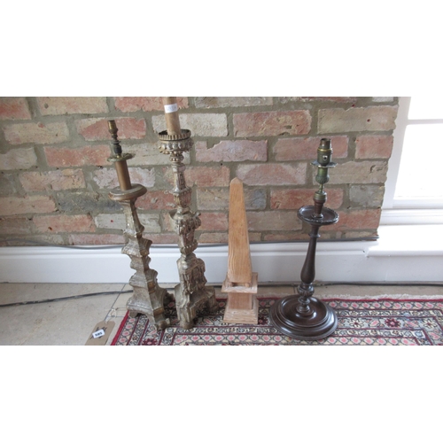 493A - A collection of Altar candlesticks and mahogany table lamp base - height of largest 66cm