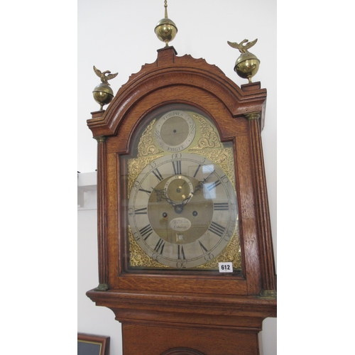 612 - An 8 day Grandfather clock with a brass dial with a plaque for Hanson London, in an oak case with we... 