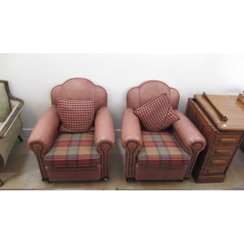 644 - A pair of 1920s Art Deco armchairs recently recovered in leather and in nice condition