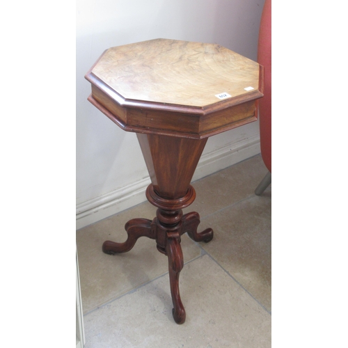 652 - A Victorian walnut trumpet shaped needlework table with fitted interior