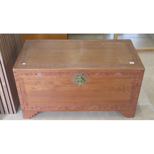 654 - A camphor wood lined blanket box carved, brass lock, 100cm wide x 50cm deep x 54cm high