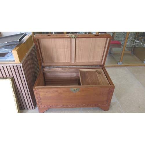 654 - A camphor wood lined blanket box carved, brass lock, 100cm wide x 50cm deep x 54cm high