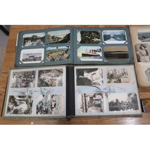 488A - Three Albums of Vintage postcards, including Oriental, a Mauchline ware box and a small Tunbridge ex... 