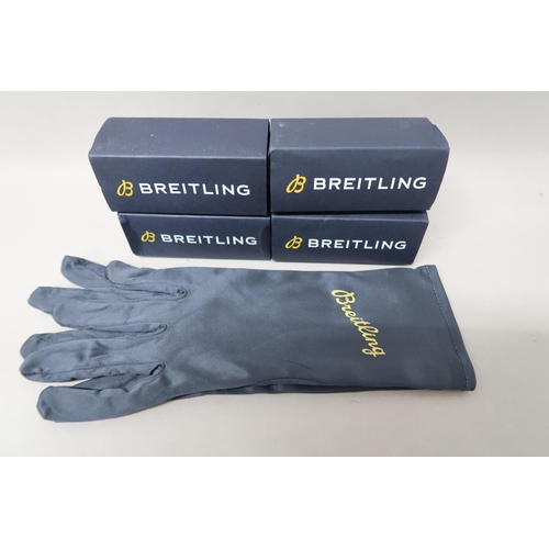 513 - Four pairs of boxed Breitling gloves