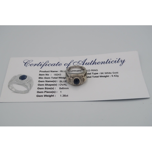 108 - A 9ct white gold ring with oval star sapphire to shoulder, approx 9.77 grams, size N