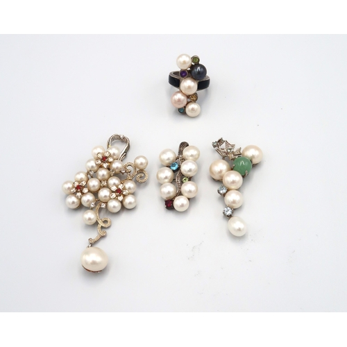 121 - A group of cultured pearl and and stone set jewellery. To include three pendants and a ring, size R ... 