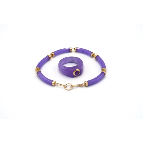 122 - An amethyst ring size T 1/2. Stamped 14K. Weight 8.22grams. An amethyst panel bracelet. Tests 14K. W... 