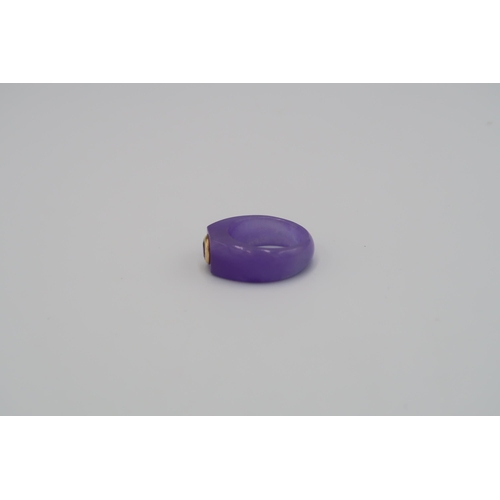 122 - An amethyst ring size T 1/2. Stamped 14K. Weight 8.22grams. An amethyst panel bracelet. Tests 14K. W... 