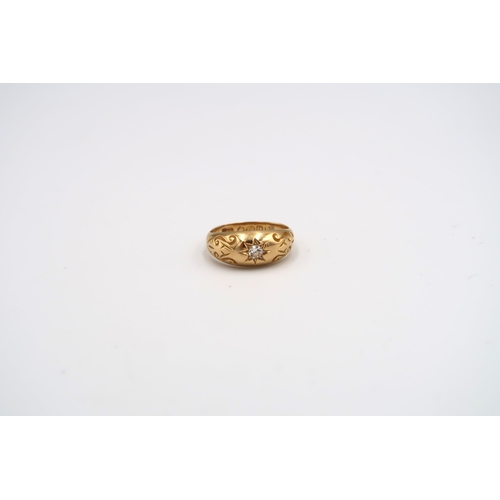 13 - An 18ct yellow gold solitaire ring with foliate engraving to shoulder - weight approx 3.24 grams - r... 