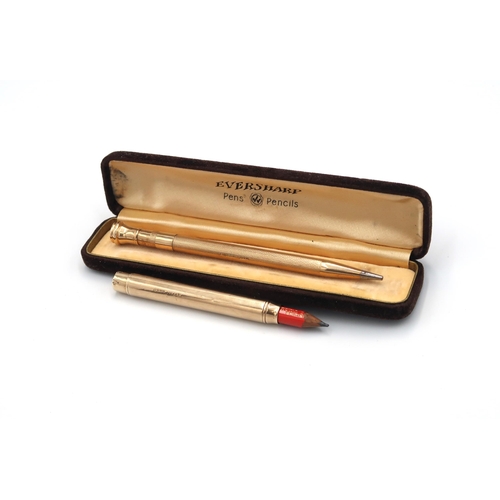 130 - A 9ct yellow gold propelling pencil base - approx weight 28.7 grams along with A 9ct yellow gold pro... 