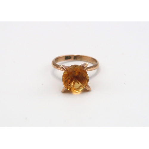 131 - A 14ct yellow gold and golden topaz ring size L 1/2 - approx weight 4.19 grams