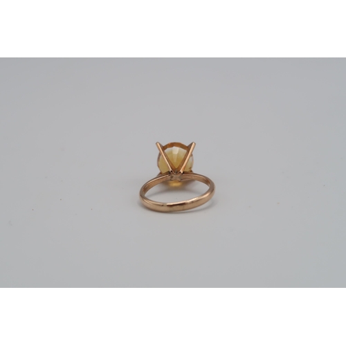 131 - A 14ct yellow gold and golden topaz ring size L 1/2 - approx weight 4.19 grams