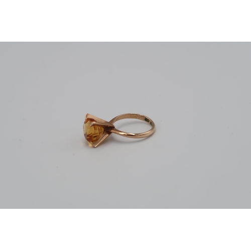 131 - A 14ct yellow gold and golden topaz ring size L 1/2 - approx weight 4.19 grams