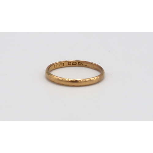 139 - A 22ct yellow gold wedding band - weight approx 1.52 grams - ring size K