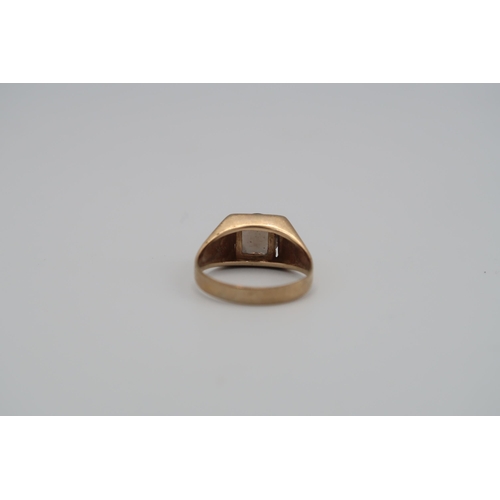 145 - Two 9ct gold rings to include and oval onyx signet ring and a smokey quartz single stone. Size P1/2 ... 