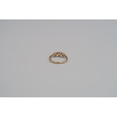 15 - A 9ct three stone ring size L - weight approx 1.61 grams