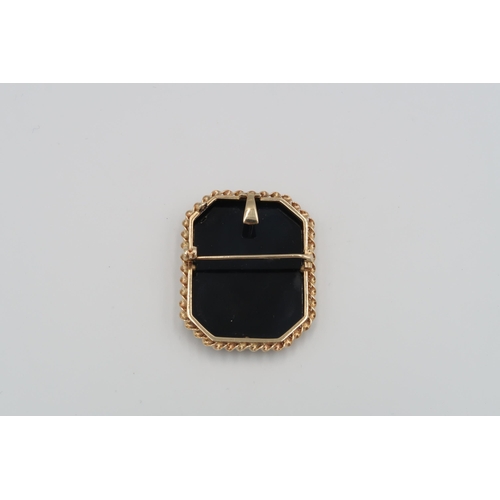 171 - A Large 9ct Gold Black Onyx Cameo pendant Brooch, of a young girl. Size 39mm x 31mm.