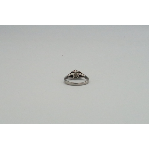 175 - An 18ct white gold and diamond ring, approx .75 grams. Size J. Estimated 0.64cts, H/I, I1/2.