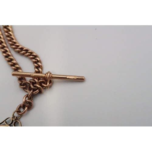 2 - A 9ct yellow gold watch chain with T bar - approx 40cm in length - with half sovereign suspended in ... 