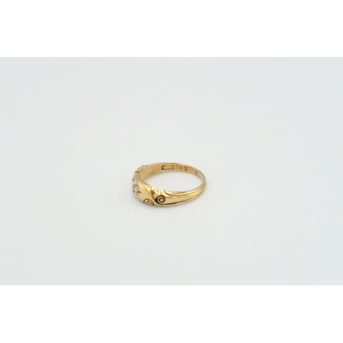 20 - An 18ct yellow gold solitaire ring, size R, weight approx 4.37 grams