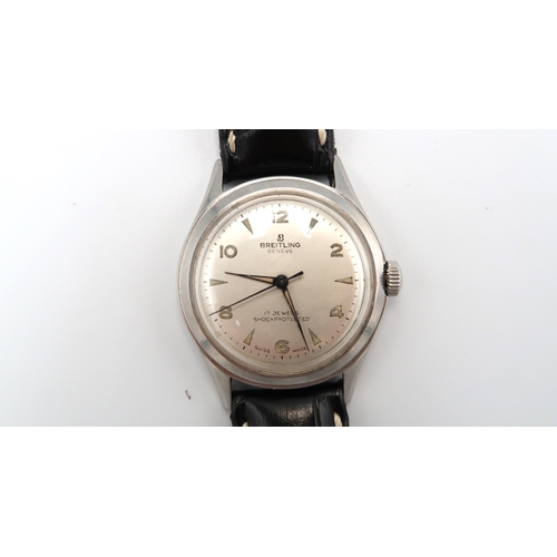 275 - A Breitling Geneve wristwatch, silvered dial with Arabic numerals at 12, 2, 4, 6, 8 and 10 - working... 