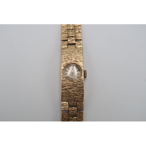 277 - A 9ct yellow gold ladies wristwatch on bracelet strap - approx total weight 23.5 grams