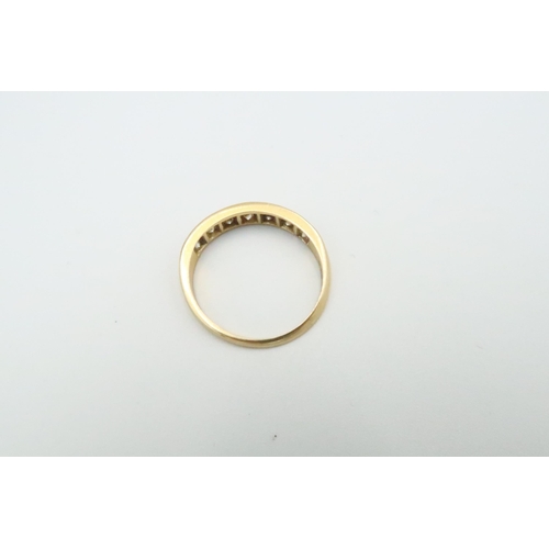 31 - An 18ct yellow Gold and Paste set dress ring Size P - weight approx 2.59 grams.