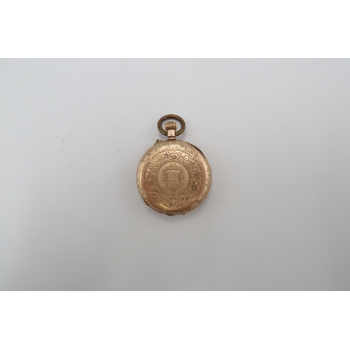 322 - An open face fob watch stamped 14K. Weight 31.24 grams. Together with another fob watch with shell d... 