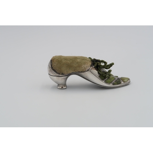 384 - A Silver and Jade Shoe pin cushion.