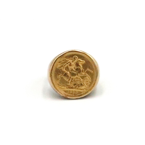 39 - A 9ct yellow gold gents ring with 1968 sovereign to shoulder. Size X. Weight approx 18.82 grams