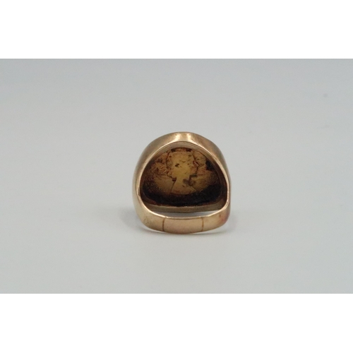 39 - A 9ct yellow gold gents ring with 1968 sovereign to shoulder. Size X. Weight approx 18.82 grams