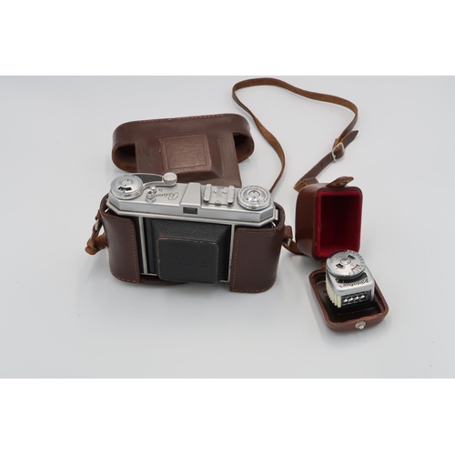 472 - A Bolex Paillard C8SL cine camera with light meter and camera