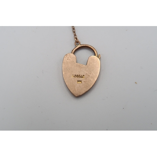 54 - A 9ct yellow gold heart shaped lock - weight approx 3.87 grams