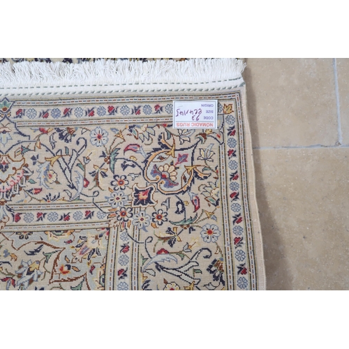 582 - A Kashan hand knotted rug, 2.24m x 1.45m, in good condition