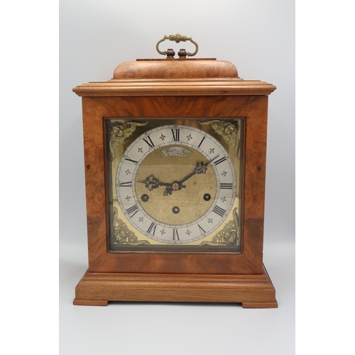 613 - Thwaites and Reed mantle clock, roman numerals to silver chapter ring in burr walnut case