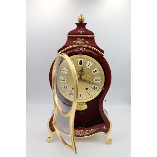 619 - A modern mantle clock with stand Neuchatel clock