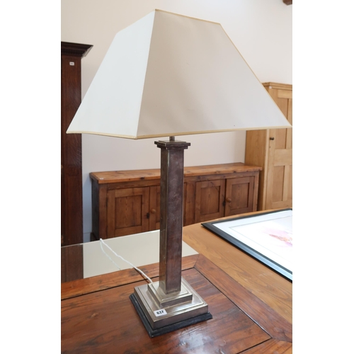 637 - A silvered finish table lamp of column form 70cm high.