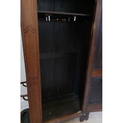 642 - An Arts and Crafts hall cupboard, circa 1900 by Shapland and Petter, Barnstable, combined cupboard a... 