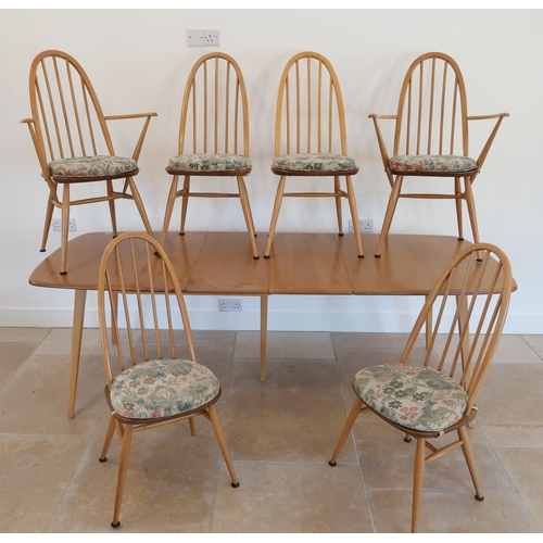 645 - A set of six Ercol blonde elm Quaker stick back chairs with blue labels to back, with an Ercol exten... 