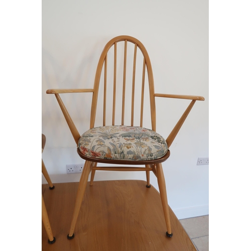 645 - A set of six Ercol blonde elm Quaker stick back chairs with blue labels to back, with an Ercol exten... 