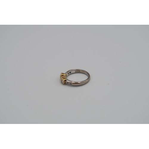 65 - An 18ct white and yellow gold diamond seven stone ring size M 1/2 - approx weight 4.52 grams