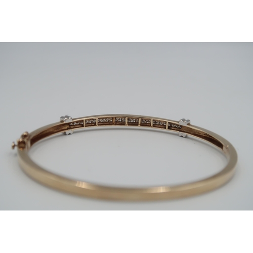 67 - An 18ct yellow gold and diamond bracelet - approx weight 14.7 grams