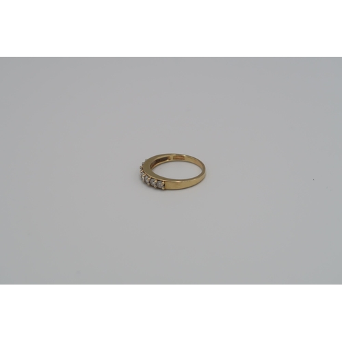 70 - An 18ct yellow gold and diamond half eternity ring, size P, approx 3.41 grams